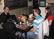 People having a good time at a typical british pub.